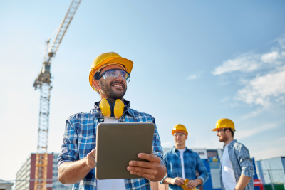 contractor smiling while writing